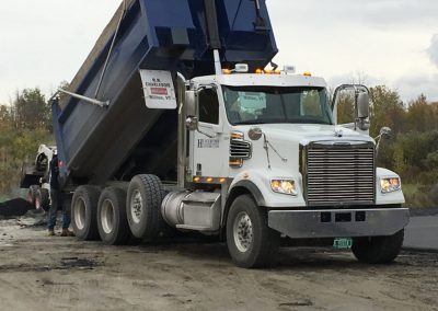 Dumping new asphalt